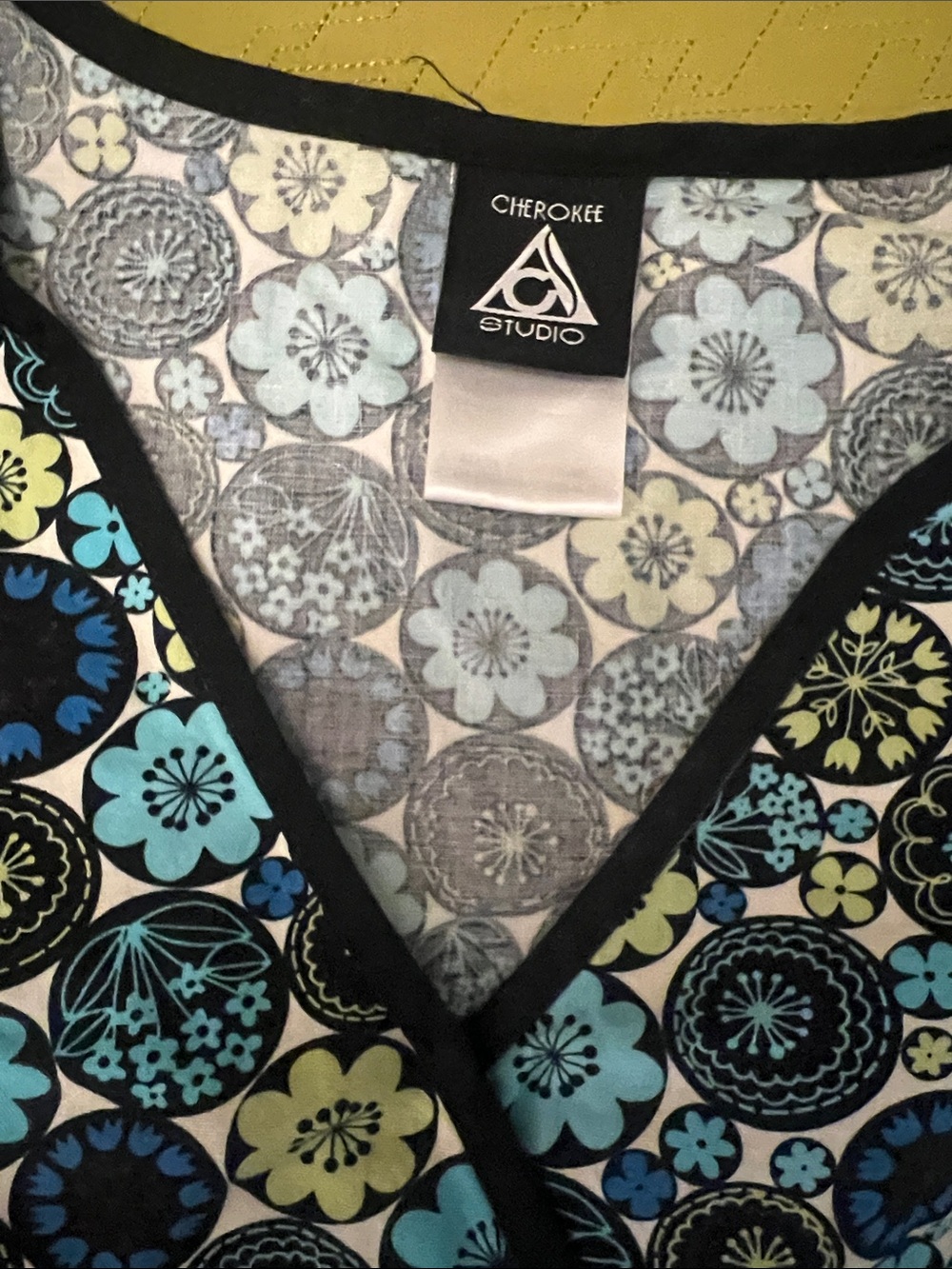 Cherokee Women’s Blue &Black Floral Wrap-Front Scrub Top - Picture 3 of 6